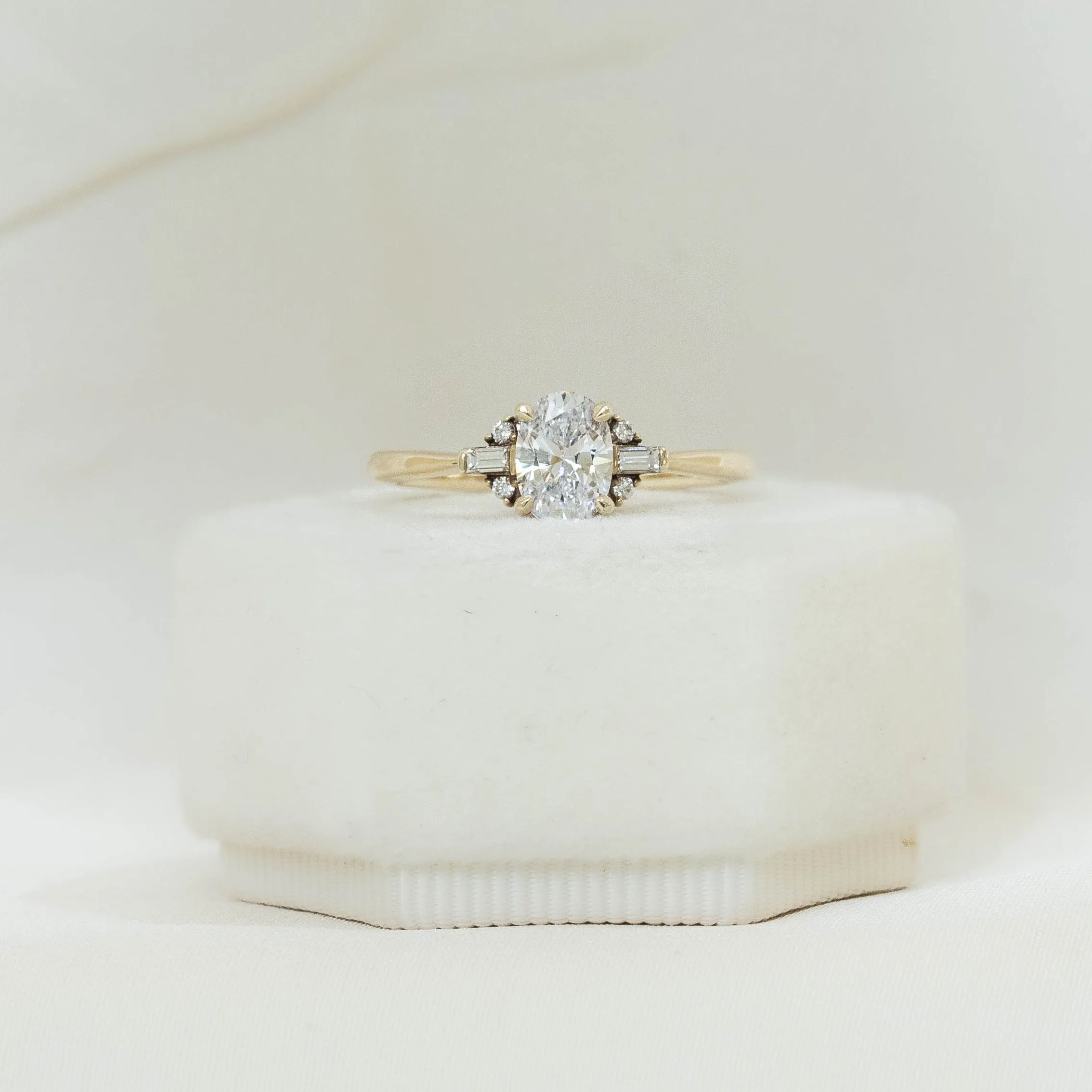 14ky Low Profile Oval with Baguette & Round Accents Diamond Ring