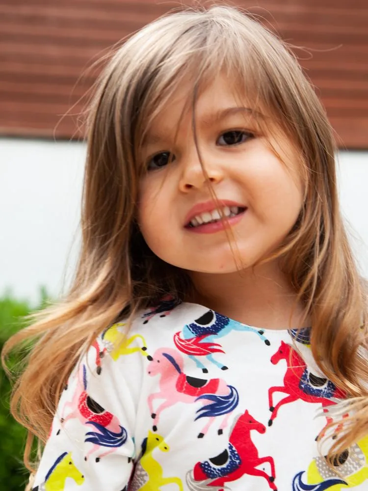 Prancing Ponies - Girls Long Sleeve Colourful Pony & White Dress with Striped Pockets - 18 months to 2 years