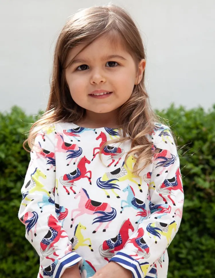 Prancing Ponies - Girls Long Sleeve Colourful Pony & White Dress with Striped Pockets - 18 months to 2 years
